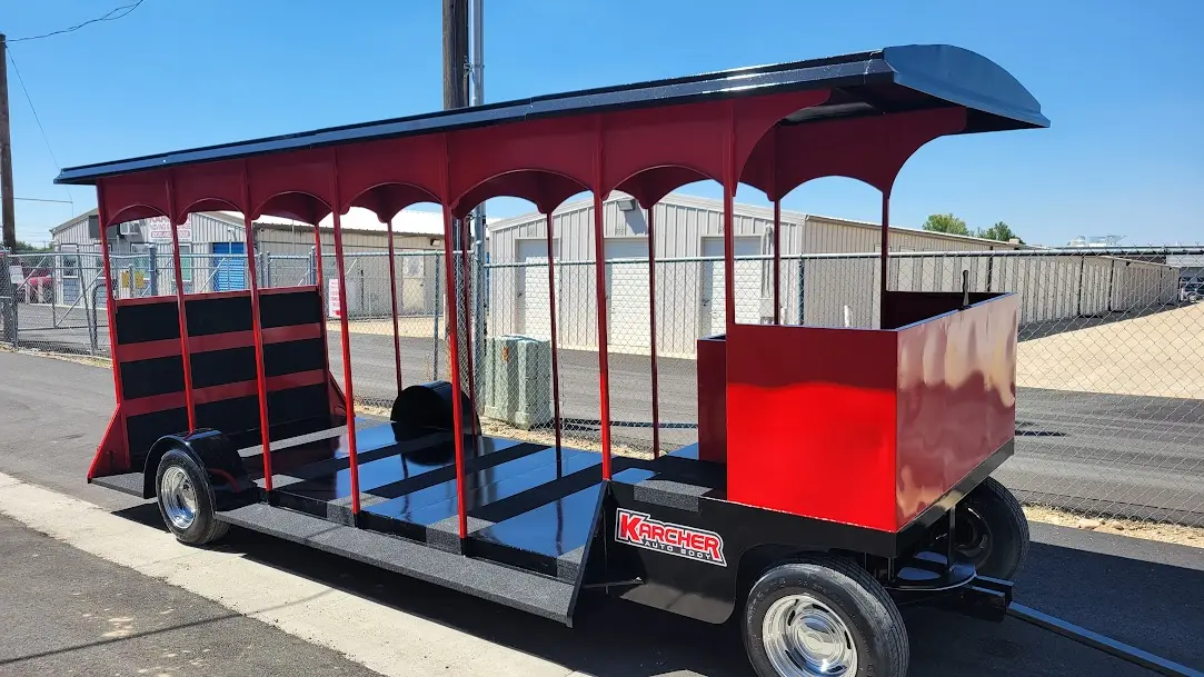 Fully restored Karcher Auto Body parade trolley